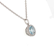 14k wg Aquamarine Pendant with Diamond Halo, includes chain